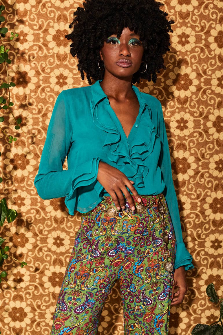http://www.thehippieshake.co.uk/cdn/shop/products/let-the-good-times-roll-teal-ruffle-blouse-912972.jpg?v=1691059676